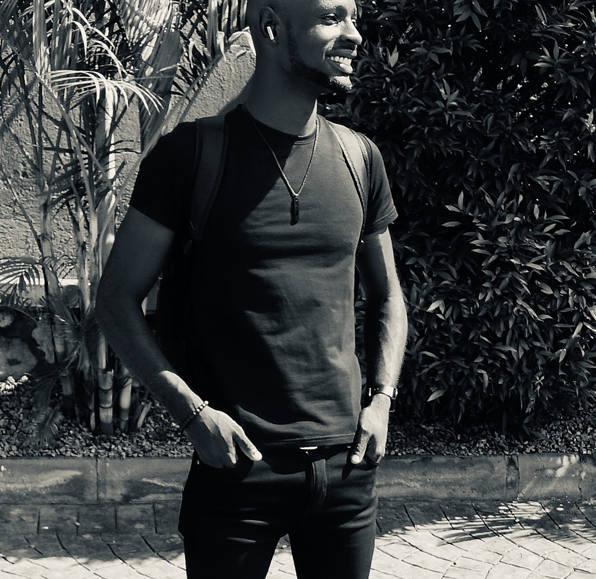 Joe Akatuhurira in a black T-shirt
